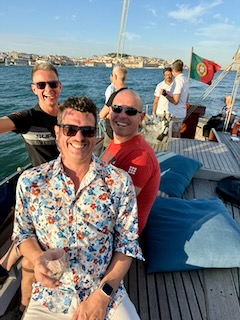 Sail crew at sunset