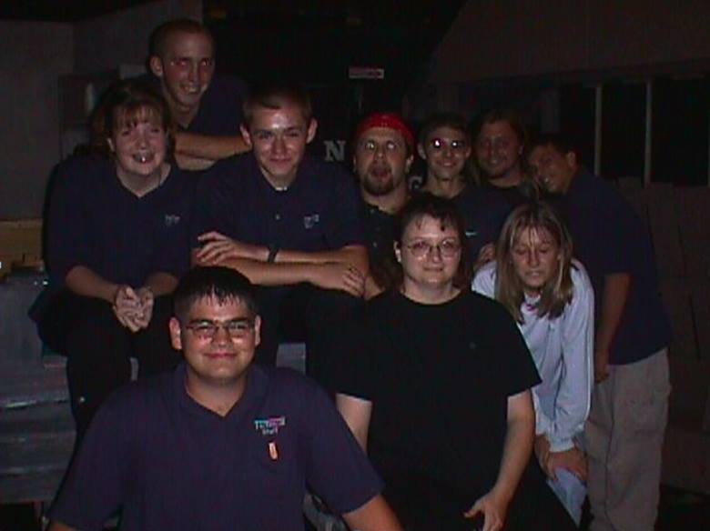 Adam at a lighting and sound board